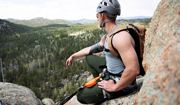 man rock climbing