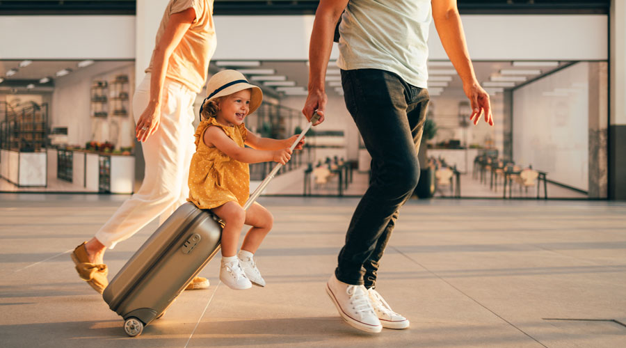 couple walking through airport