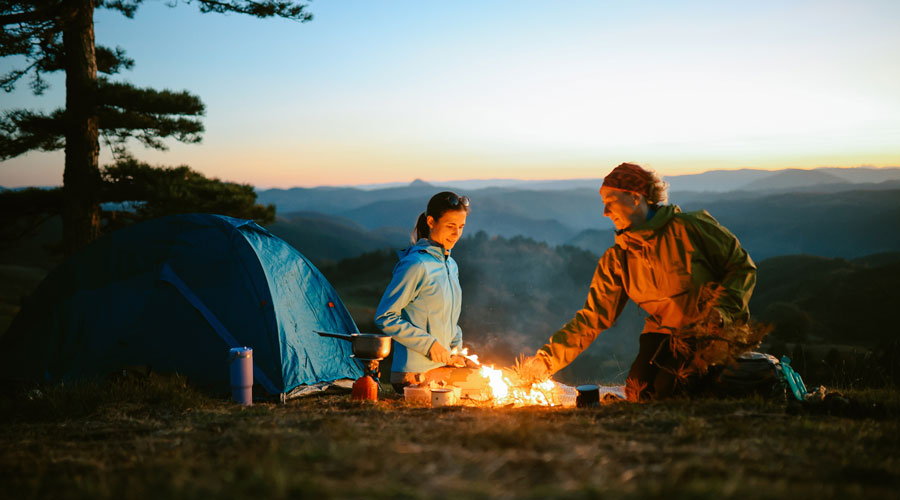 a couple camping in the moutains